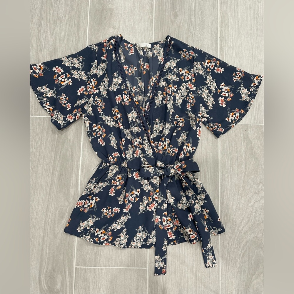 Sienna Sky Faux Wrap Peplum Blouse
